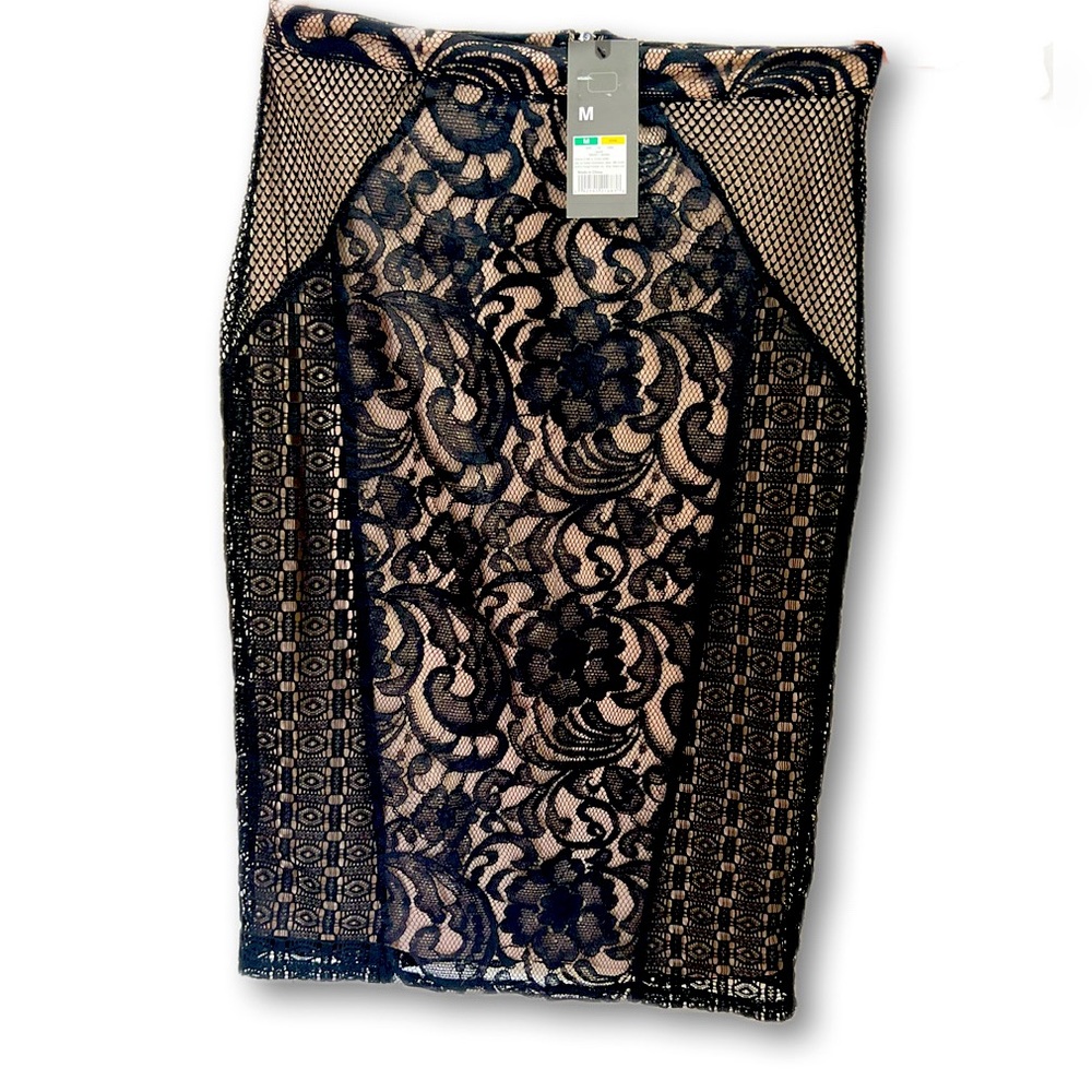 Size Medium Mossimo lace detail pencil skirt. Black lace with cream slip. NWT.